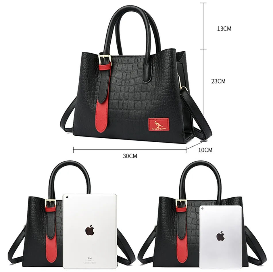 Miniatura: Black handbag with red accents, dimensions shown