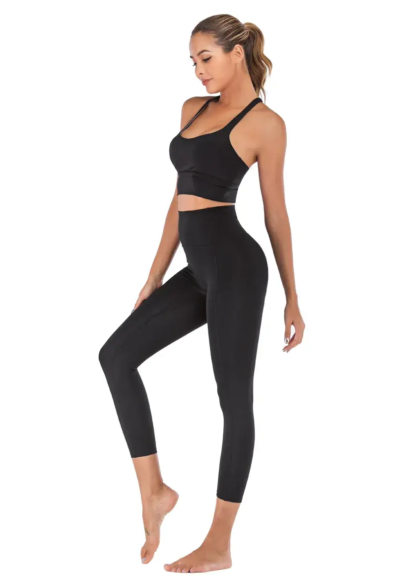 Miniatura: Woman in black yoga outfit