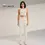 Thumbnail: Woman in off-white athletic wear