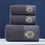Miniatyrbilde: Three gray hand towels, embroidered logo