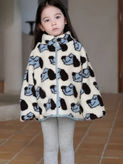 Young girl modeling a fleece jacket with camera print, gray leggings outfit.