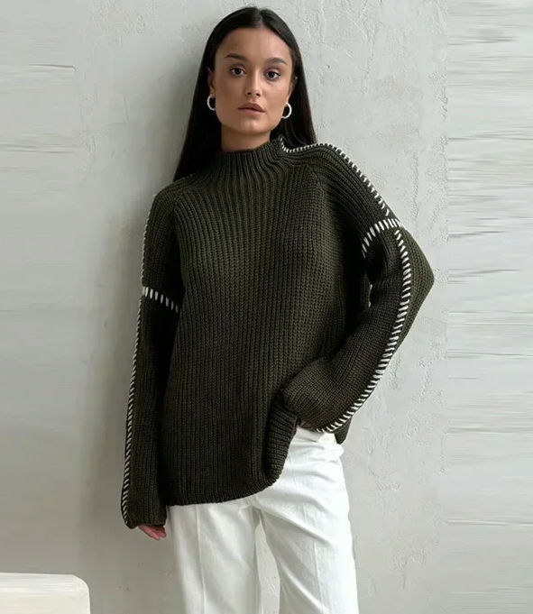 Woman in olive green mock neck sweater