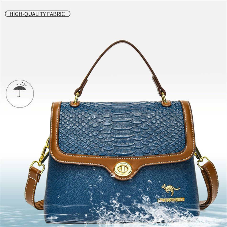 Miniatură: Blue leather handbag with crossbody strap