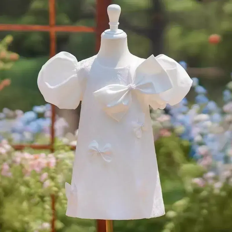 Miniatură: White puff-sleeve dress with bow detail
