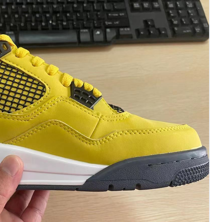 Miniature : Yellow Air Jordan 4 sneakers