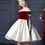 Miniatura: Girl in burgundy and cream dress