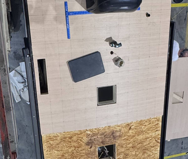 camper roof getting ready for crazyseal. The grid lines are the screw pattern holding it in place