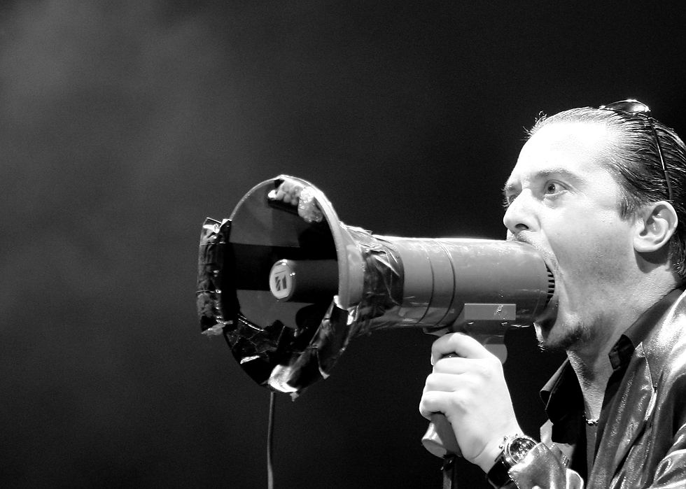 Mike Patton screaming in his megaphone