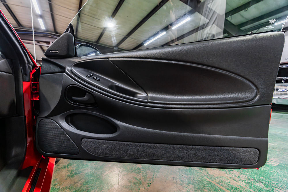 2003 Ford Mustang Mach 1 in Torch Red with 4.6L V8 and automatic transmission