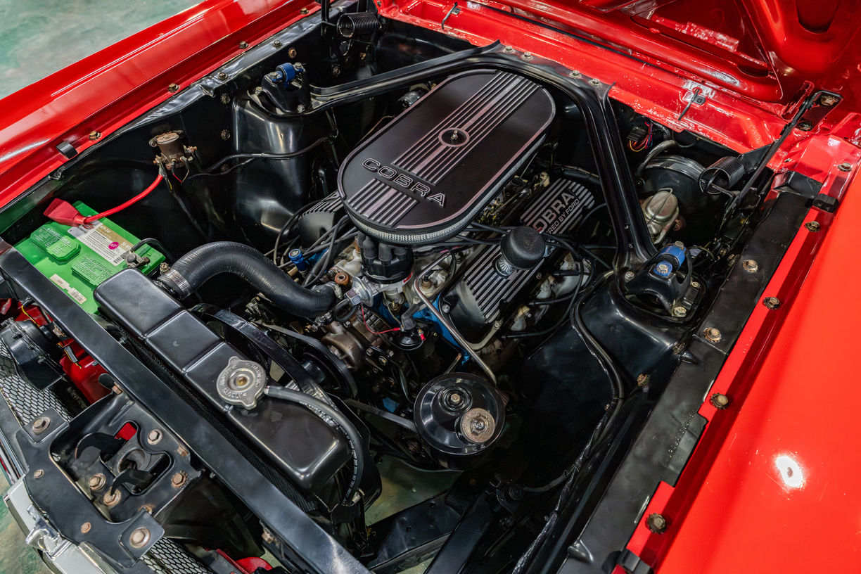 1965 Ford Mustang Rangoon Red with A-code 302 engine and C4 automatic transmission