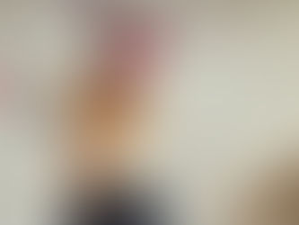 Magician without hands throwing playing cards into the air