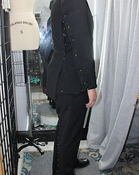 mens black suit pining process for alterations