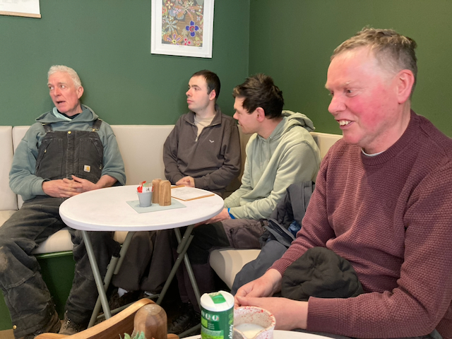 Men enjoying the café
