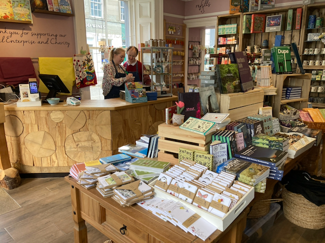 Table of products in front of of the shop counter