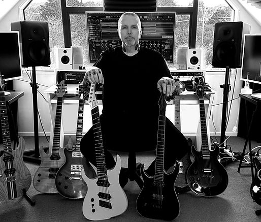 Andrew Langsford with guitars