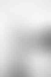 mum to be in the Highcliffe beach sea with her pregnant bump on show in black and white