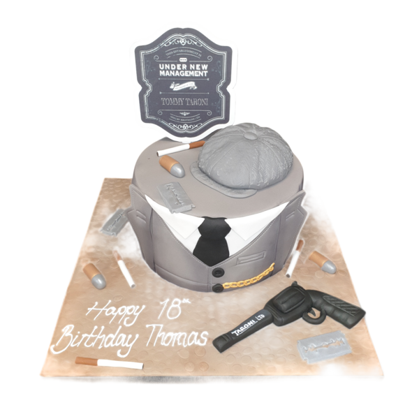 Bespoke Peaky Blinders celebration cake with vintage razor blade and flat cap design, Solihull, West Midlands.