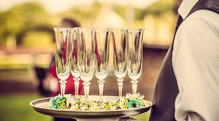 Waiter with Champagne Flutes