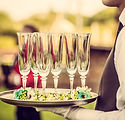 Waiter with Champagne Flutes