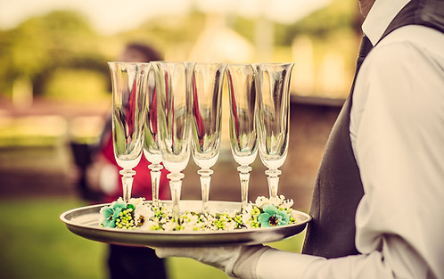 Waiter with Champagne Flutes