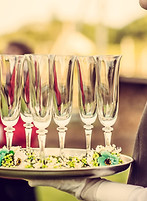 Waiter with Champagne Flutes