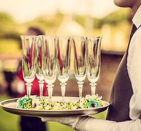 Waiter with Champagne Flutes