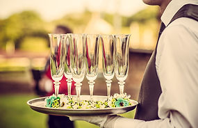 Waiter with Champagne Flutes