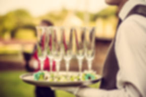 Waiter with Champagne Flutes