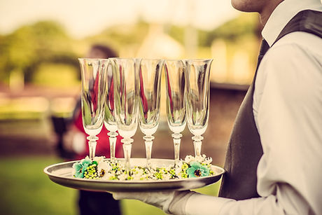 Waiter with Champagne Flutes