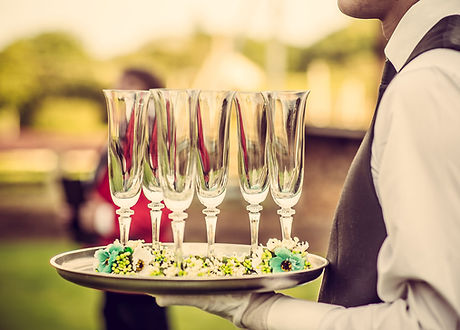 Waiter with Champagne Flutes