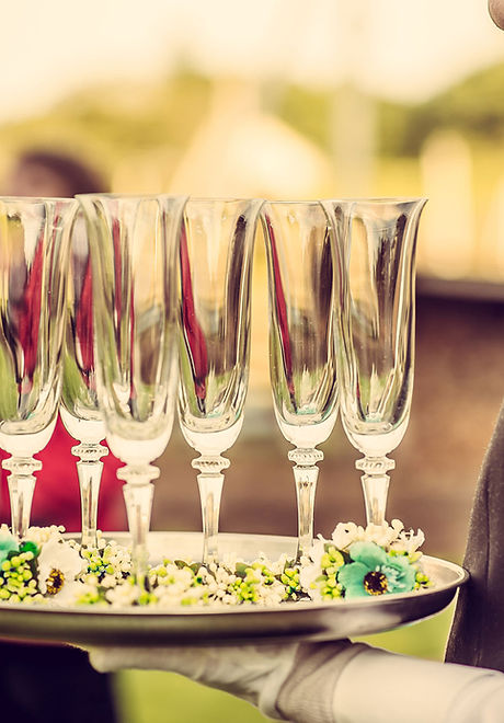 Waiter with Champagne Flutes