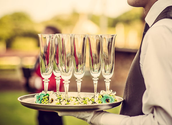 Waiter with Champagne Flutes