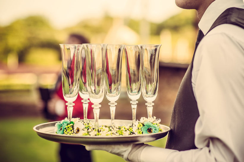 Waiter with Champagne Flutes