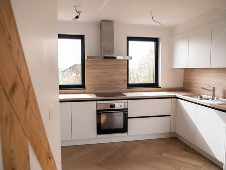 Rénovation et extension d'un bâtiment à Bouge, architecte