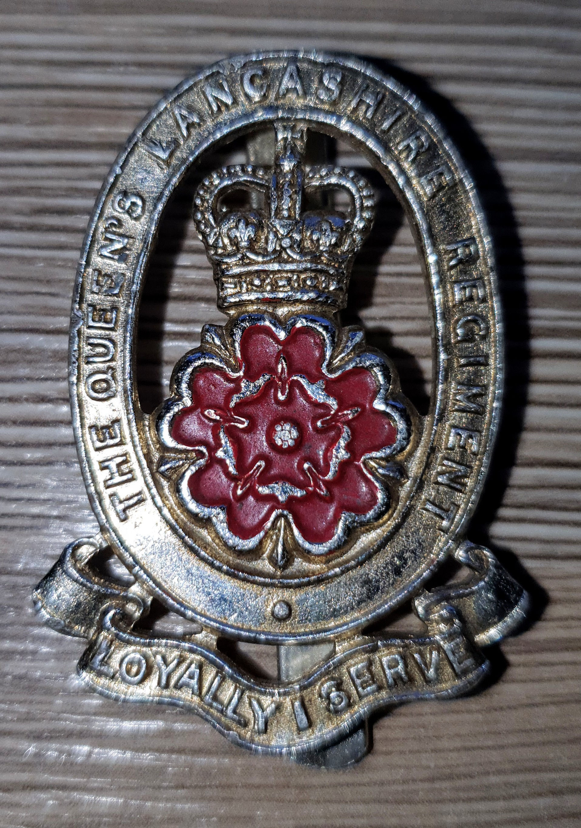 Queens Lancashire Regiment cap badge. 