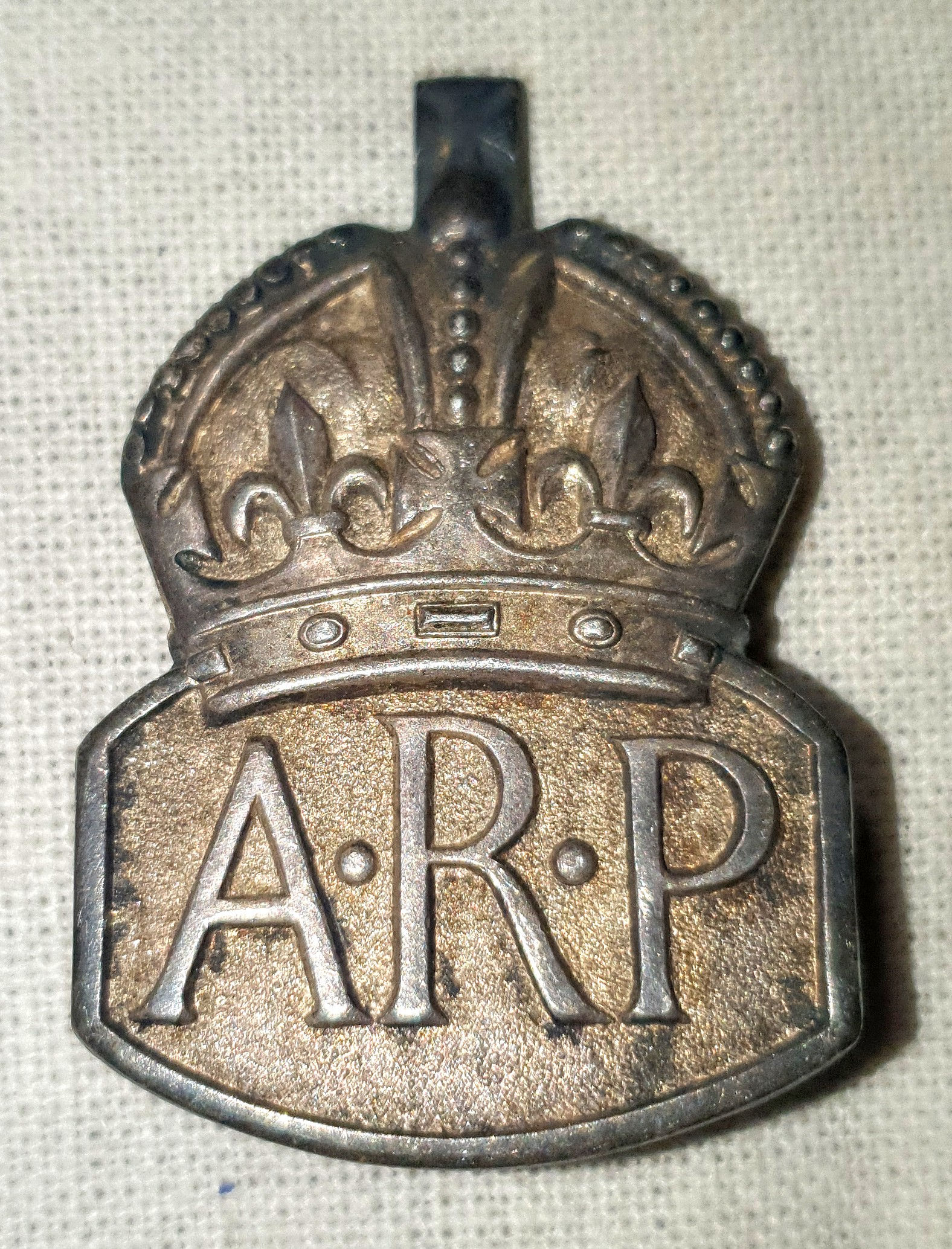 Silver ARP badge 