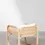 Thumbnail: Fauteuil en rotin et cannage avec coussin blanc crème