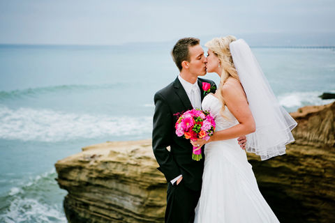 Beach wedding vow renewal at Sunset Cliffs.