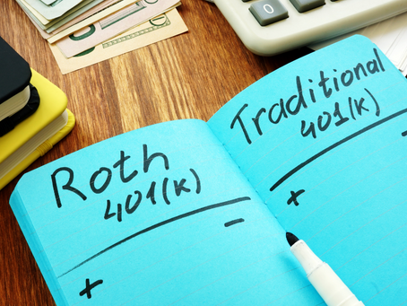 Two blue sticky notes on a desk, one labeled "Roth 401(k)" with plus and minus signs, and the other "Traditional 401(k)" with plus and minus signs, symbolizing the comparison of their pros and cons for retirement contributions.