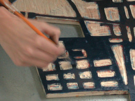 Nicole Strasburg painting her woodcut Underpass series in 2001. Photo: © 2001 Richard Tullis