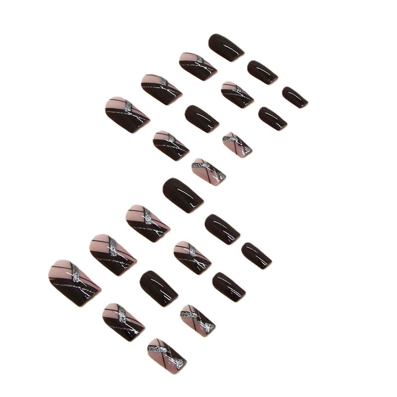 Thumbnail: Two sets of dark press-on nails with marble accents