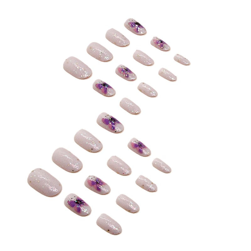 Thumbnail: Sunset Serenade Press-On Nails, short with purple and pink designs.