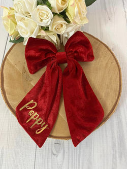 https://www.bowsandfrills.com/product-page/large-red-velvet-bow-can-be-personalised
