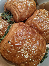 Spinach and Cheese Croissant: Flaky Croissant with fresh spinach, parmesan cream sauce, and lots of toasted sesame.