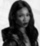 a young woman wearing a black hooded cloak