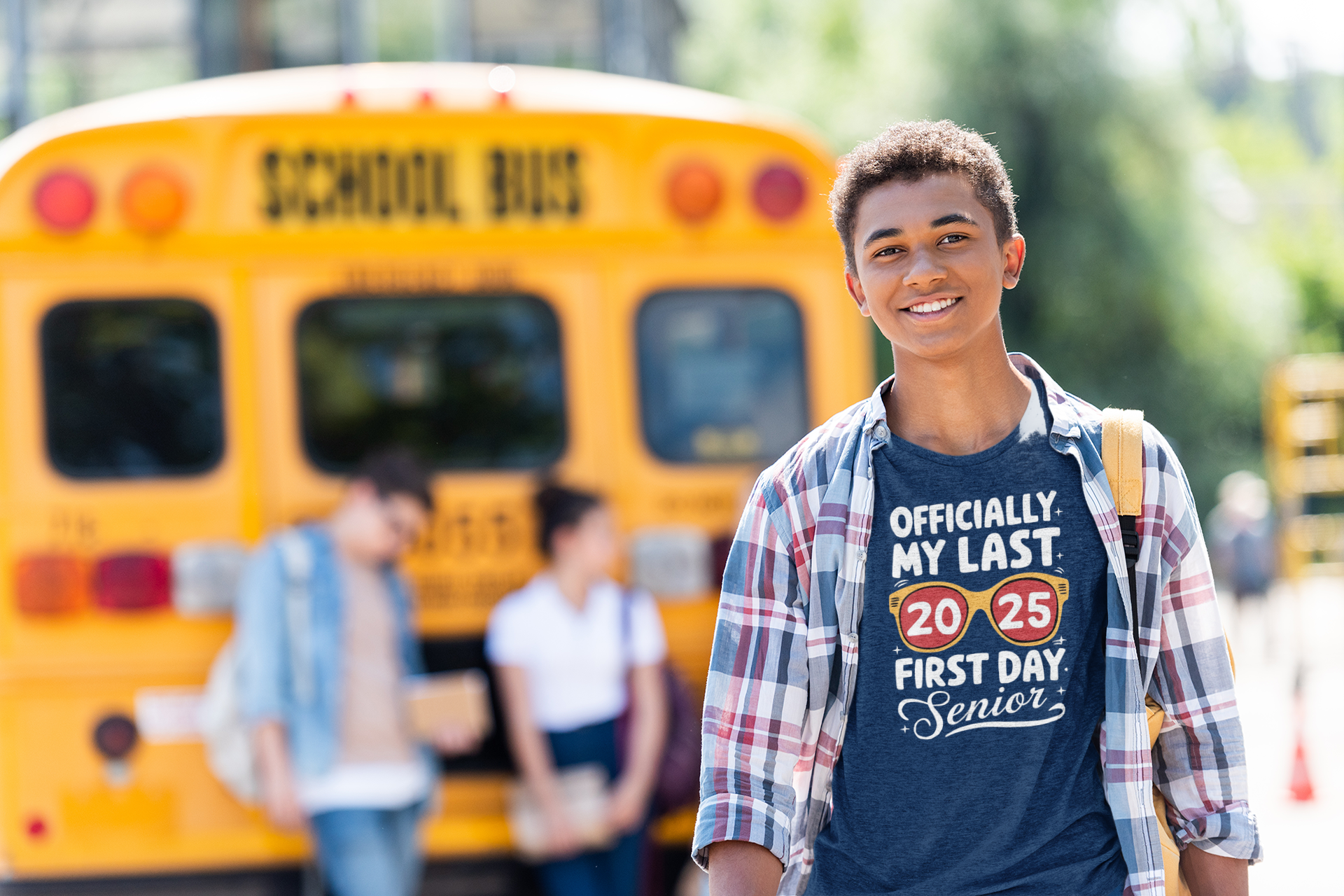 boy wearing navy tshirt with last first day senior 2025 graphic design