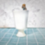 Handmade white ceramic cup with a sculpted dog head peeking over the rim, Handcrafted Ceramic Cup with Sculptural Dog Handle2