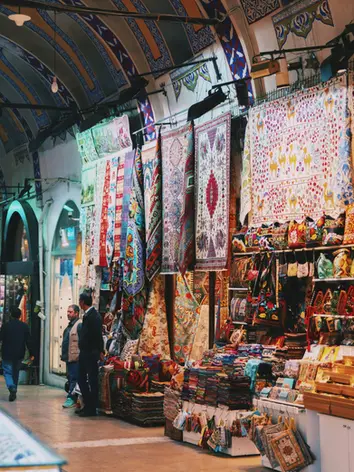 Vibrant streets of the Grand Bazaar filled with traditional Turkish lamps and crafts. Discover this shopping paradise just a short trip from Casa Rosa Suites.