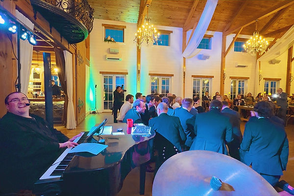 The whole fraternity showed up at The Seclusion in Lexington, VA as one of the brothers get married. Here you see Adam leading the group in serenading the bride with the traditional fraternity song.