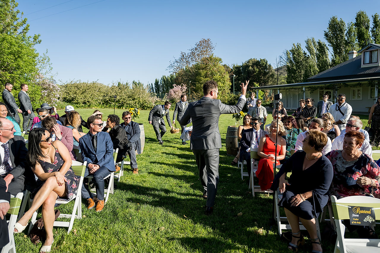 groomsmen making an entrance at canberra wedding